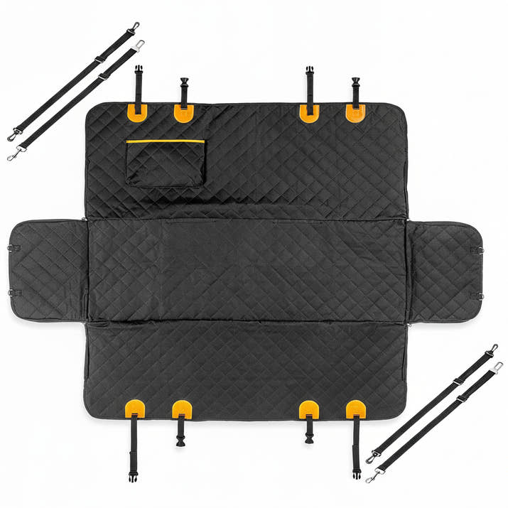 Adjustable straps securing waterproof dog seat cover to car headrests