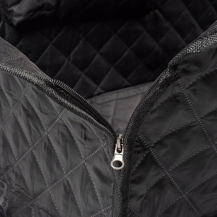 Close-up of quilted waterproof fabric on dog car seat cover